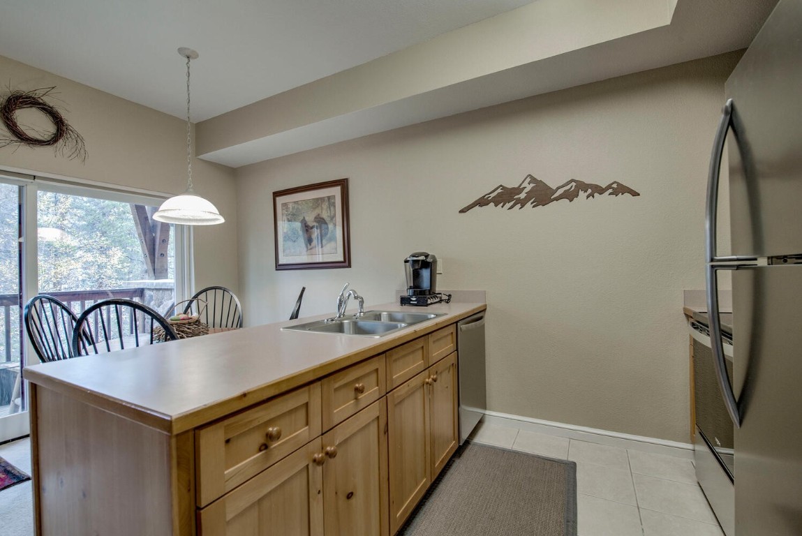 97 Lake Ridge Circle, Unit 1854 Keystone, CO 80435 - Photo 10 of 38 a bathroom with a sink a mirror and a shower