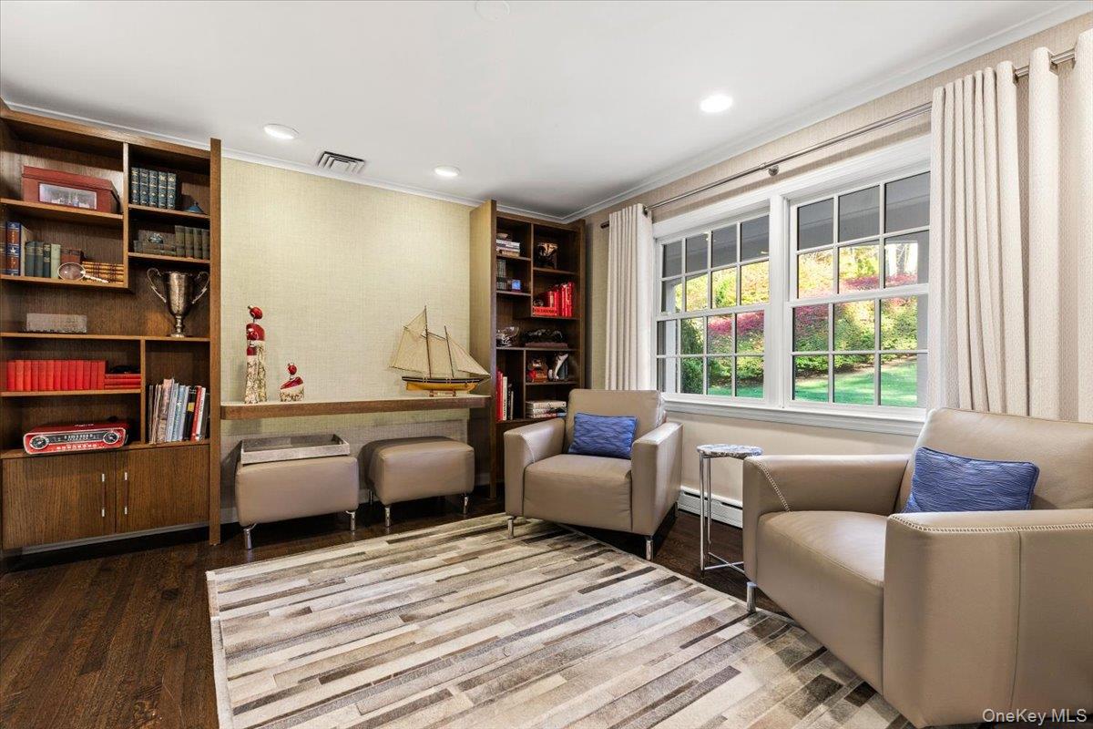 6 Valley Place Harrison, NY 10528 - Photo 12 of 37 a living room with furniture and a large window
