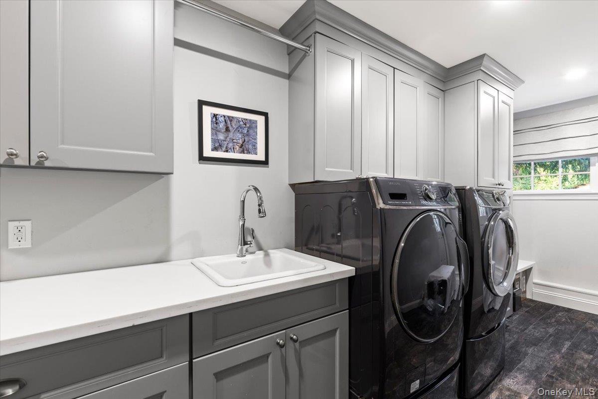 6 Valley Place Harrison, NY 10528 - Photo 18 of 37 a sink with a washer and dryer