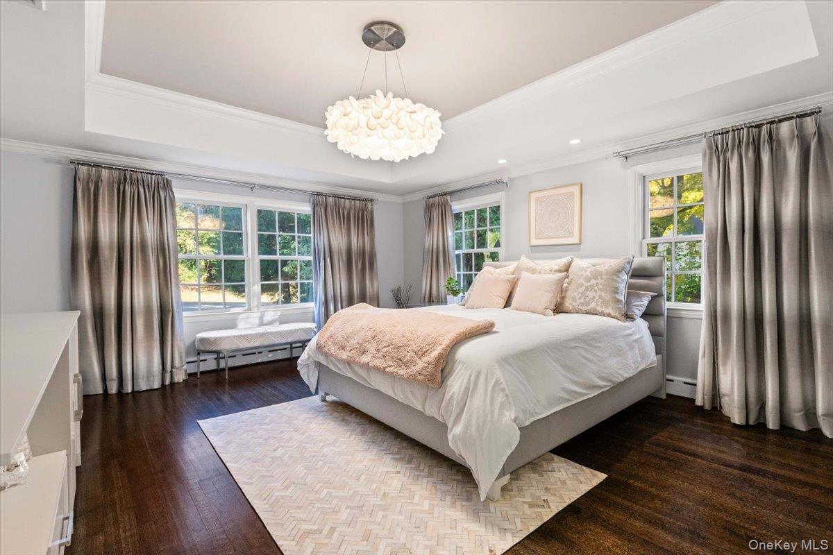 6 Valley Place Harrison, NY 10528 - Photo 19 of 37 a bedroom with a large bed and a large window