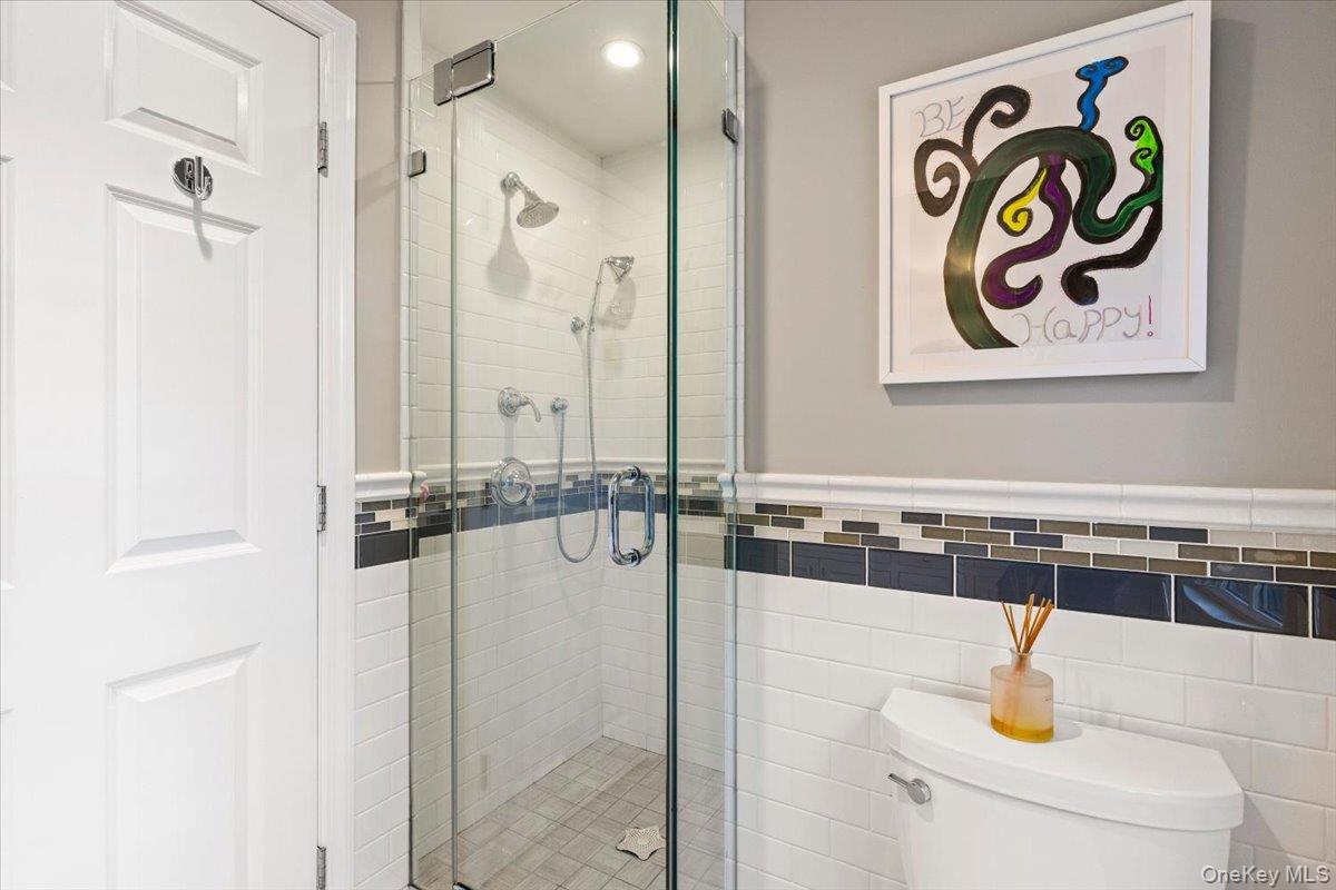 6 Valley Place Harrison, NY 10528 - Photo 25 of 37 a bathroom with a shower