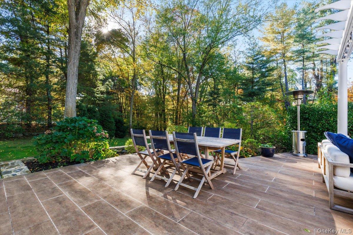 6 Valley Place Harrison, NY 10528 - Photo 30 of 37 a view of a tables and chairs in the patio
