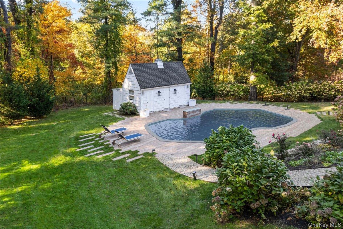 6 Valley Place Harrison, NY 10528 - Photo 31 of 37 a view of a house with a yard