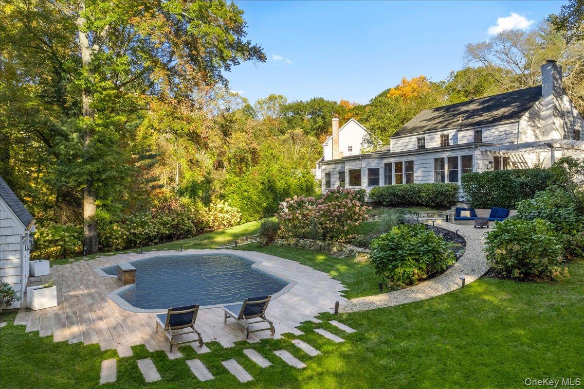 6 Valley Place Harrison, NY 10528 - Photo 32 of 37 a view of a patio with table and chairs and potted plants