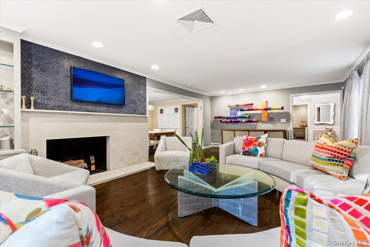 6 Valley Place Harrison, NY 10528 - Photo 3 of 37 a living room with furniture and a fireplace
