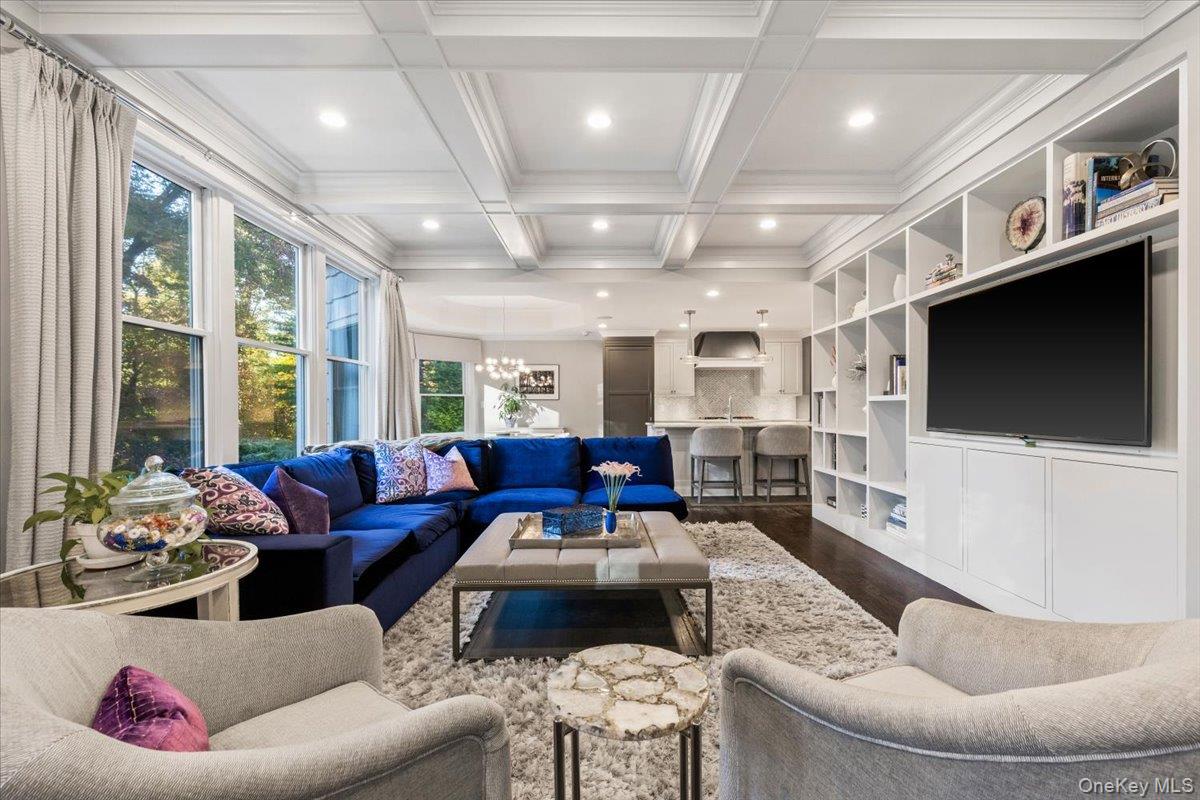 6 Valley Place Harrison, NY 10528 - Photo 9 of 37 a living room with furniture fireplace and a flat screen tv