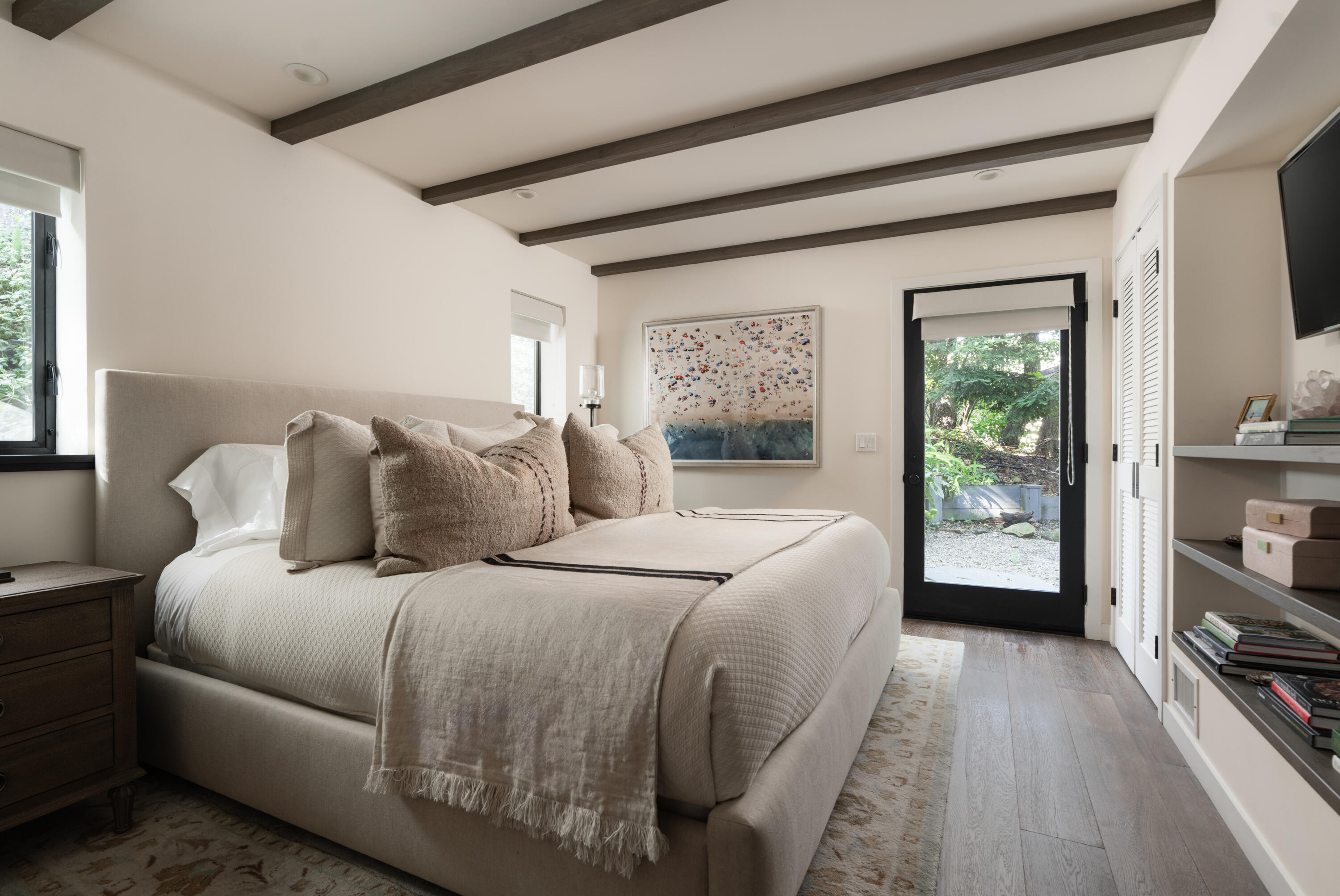 1103 Camino Viejo Road Montecito, CA 93108 - Photo 19 of 27 a bedroom with a large bed and a flat tv screen on dresser