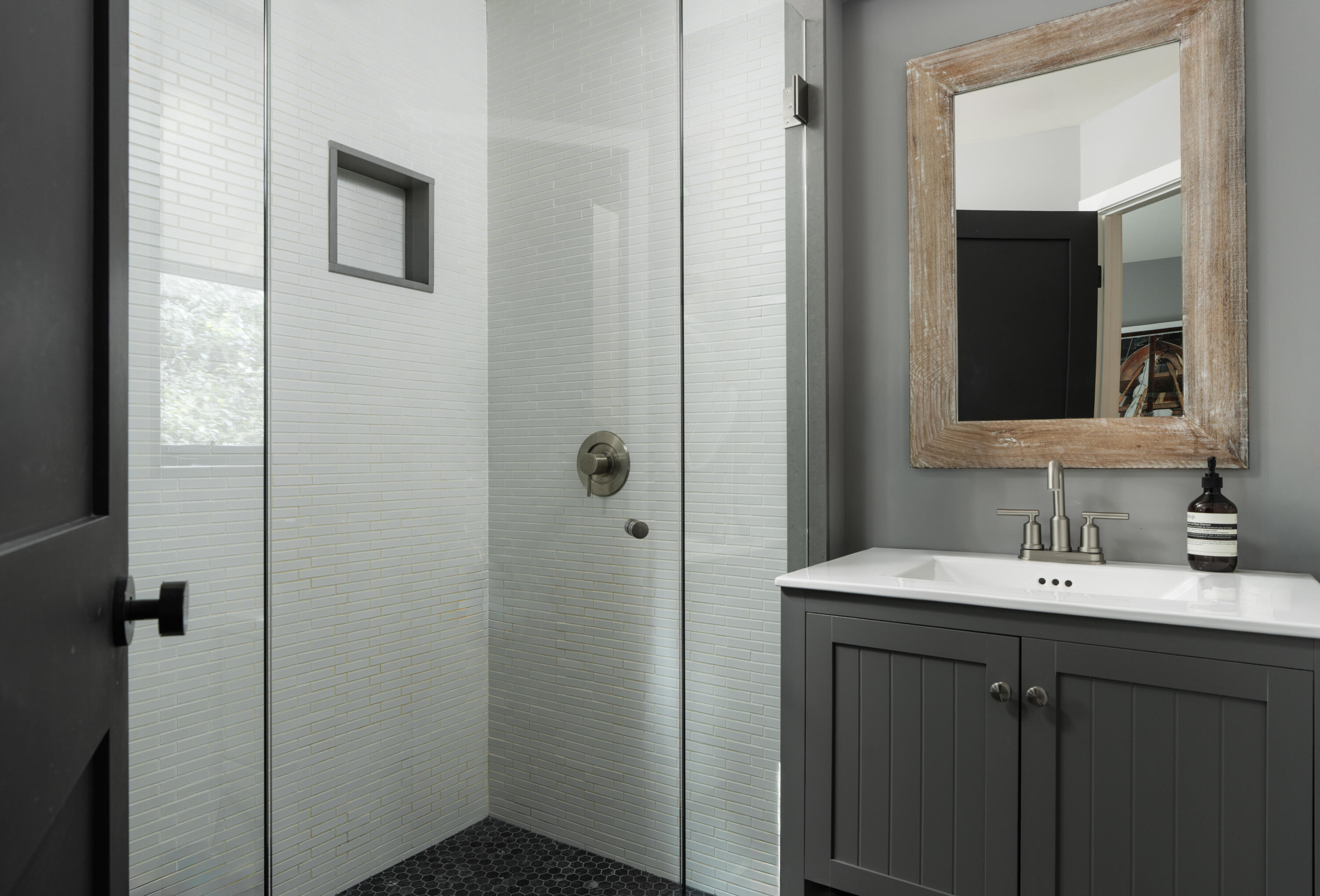 1103 Camino Viejo Road Montecito, CA 93108 - Photo 20 of 27 a bathroom with a sink and a mirror