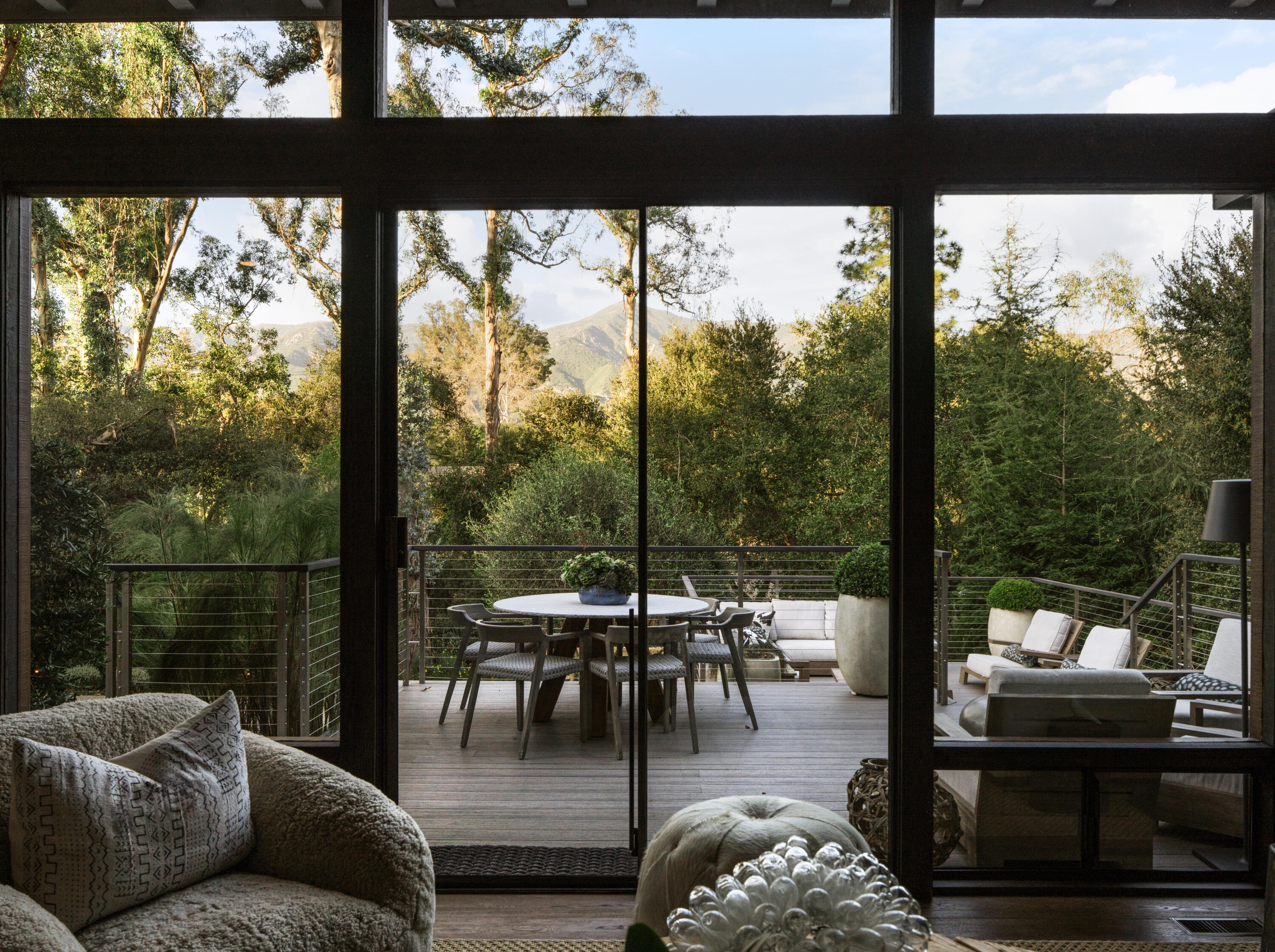 1103 Camino Viejo Road Montecito, CA 93108 - Photo 3 of 27 a balcony with furniture and a view of a city from a balcony