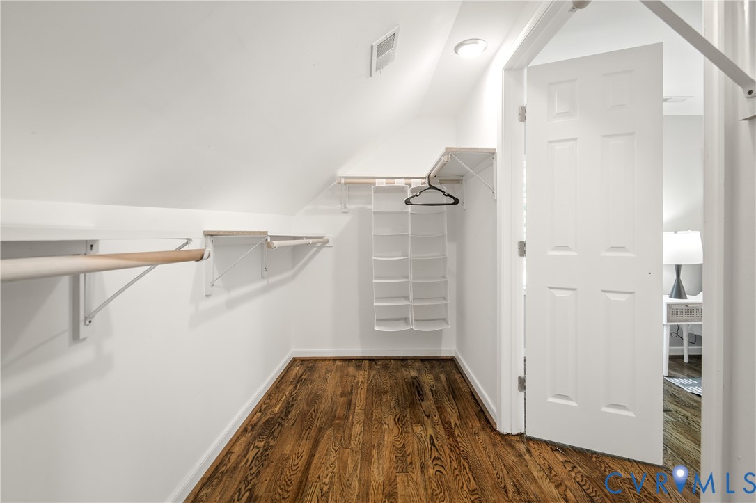 6304 Engel Road Richmond, VA 23226 - Photo 14 of 37 a view of walk in closet with empty racks