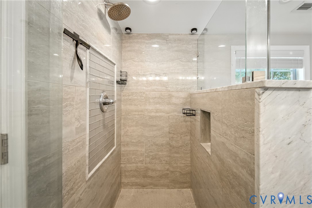 6304 Engel Road Richmond, VA 23226 - Photo 17 of 37 a bathroom with a shower