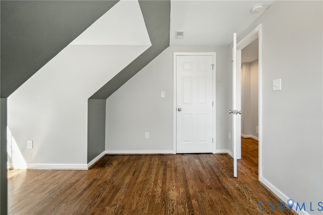 6304 Engel Road Richmond, VA 23226 - Photo 21 of 37 a view of an empty room with wooden floor