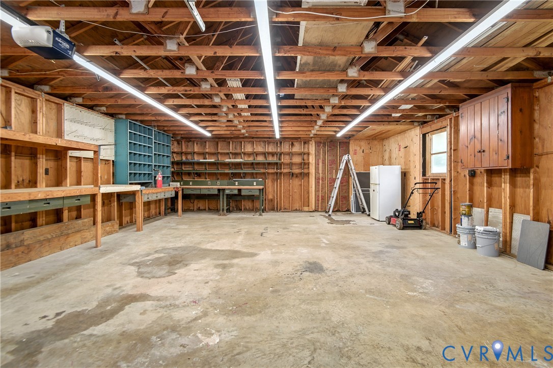 6304 Engel Road Richmond, VA 23226 - Photo 30 of 37 a view of a big room with wooden roof and windows