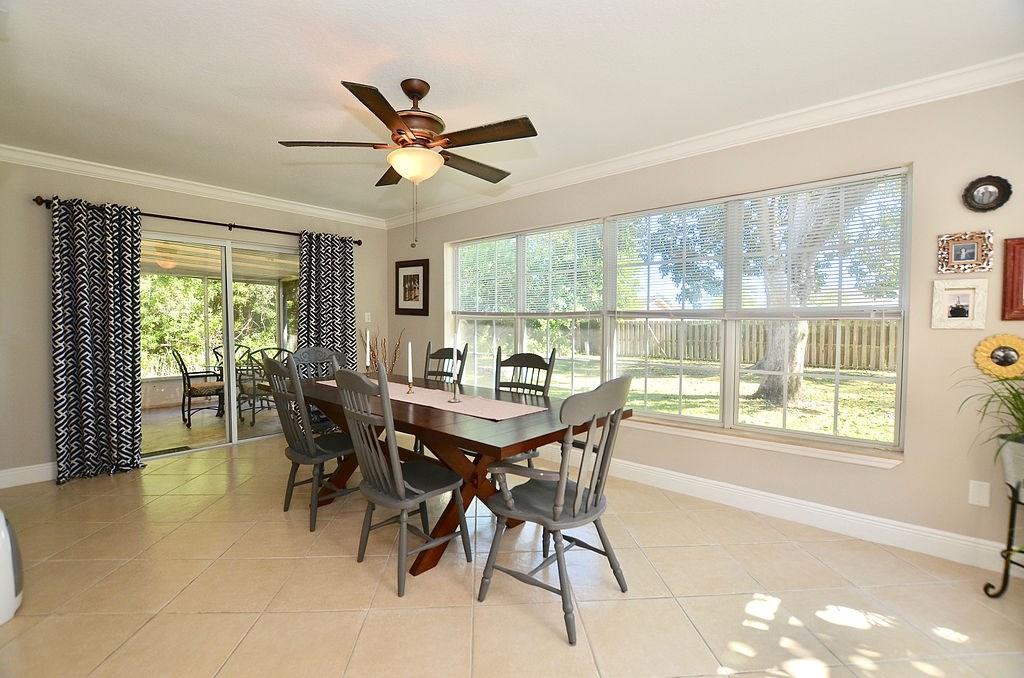 459 Southwest Byron Street Port St. Lucie, FL 34983 - Photo 20 of 51 a view of a dining room with furniture window and outside view