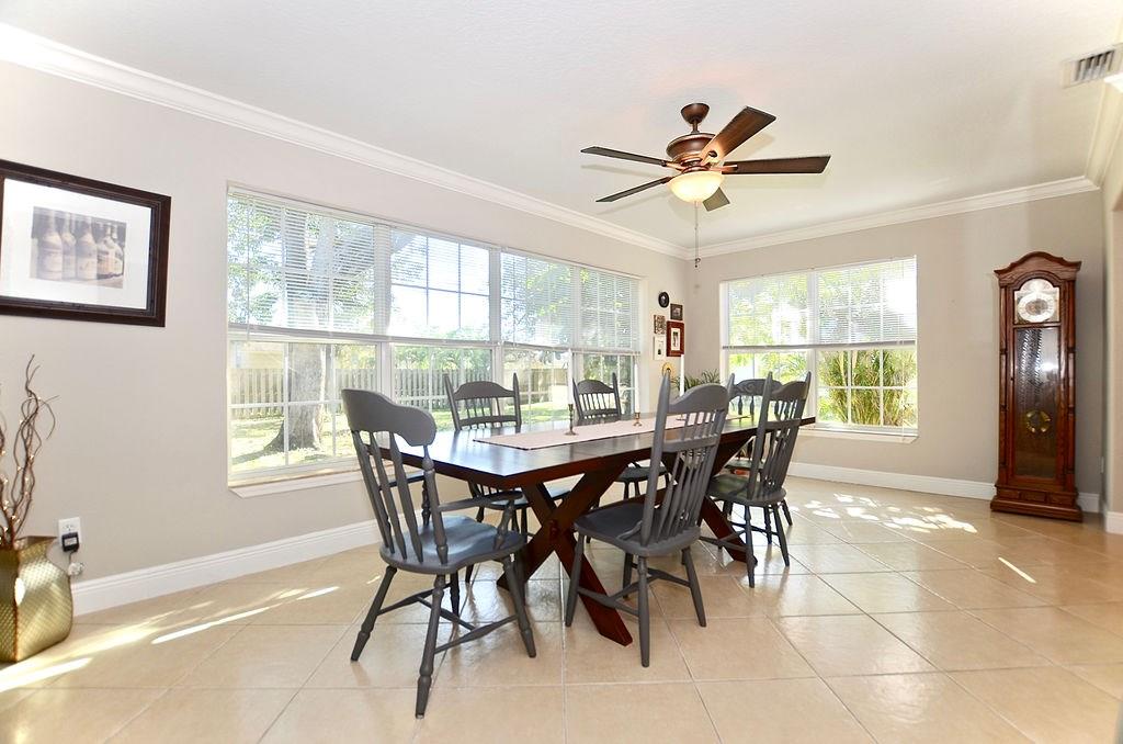 459 Southwest Byron Street Port St. Lucie, FL 34983 - Photo 22 of 51 a view of a dining room with furniture window and outside view