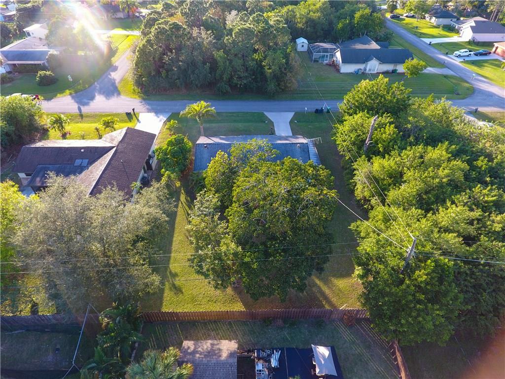 459 Southwest Byron Street Port St. Lucie, FL 34983 - Photo 47 of 51 a view of an outdoor space and a yard