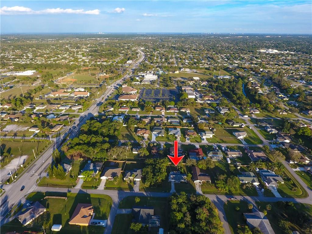 459 Southwest Byron Street Port St. Lucie, FL 34983 - Photo 51 of 51 an aerial view of city and lake