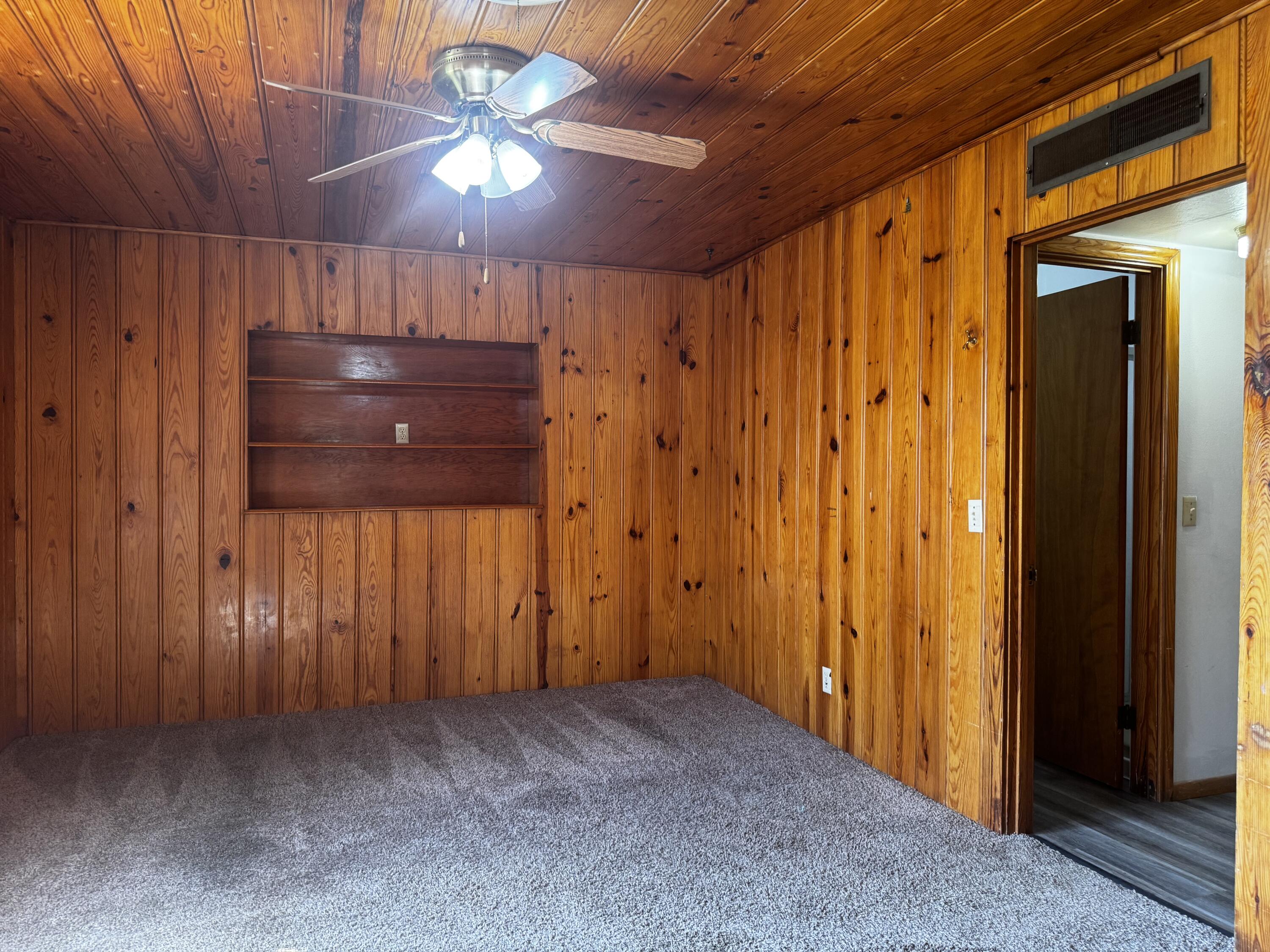 110 North 15th Street Lamesa, TX 79331 - Photo 16 of 28 a view of room with a ceiling fan