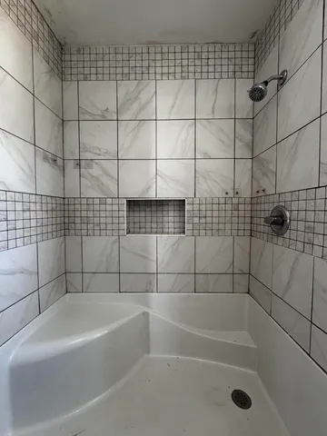 a bathroom with a bathtub