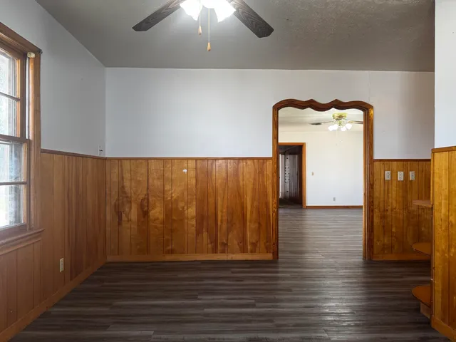 a view of a livingroom with wooden floor