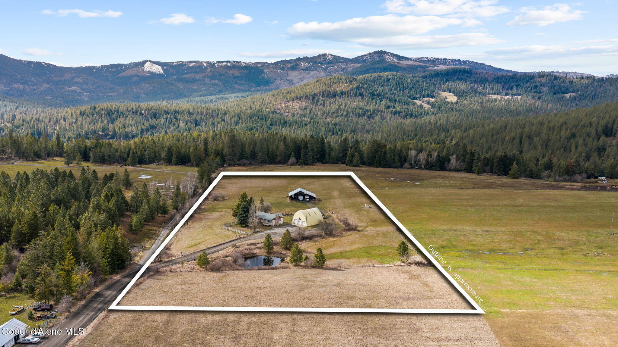 8827 West Carnie Road Coeur D'Alene, ID 83814 - Photo 2 of 53 1-web-or-mls-DJI_20260309144513_0122_D o