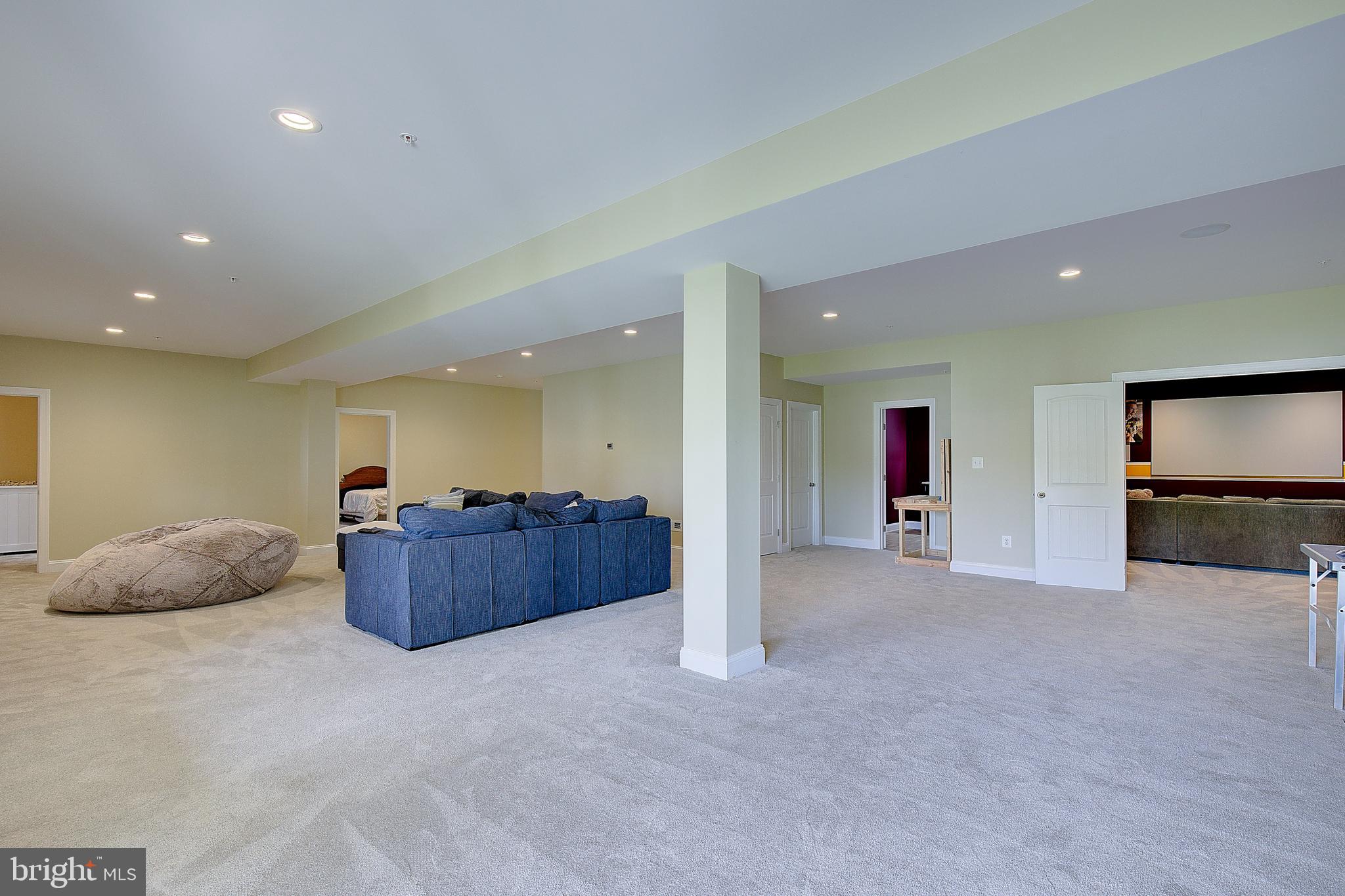 2393 Garrity Road St. Leonard, MD 20685 - Photo 54 of 76 Massive finished basement with cozy seating
