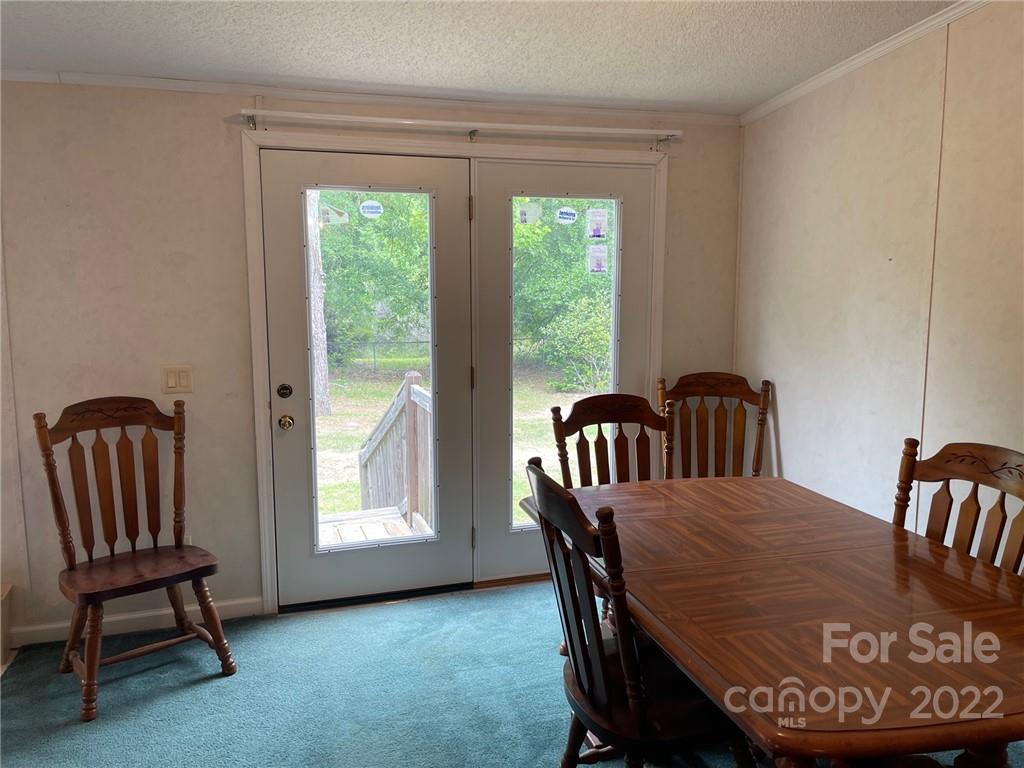 97 County Rd S-13-678 Jefferson, SC 29718 - Photo 14 of 24 a view of a room with furniture and windows