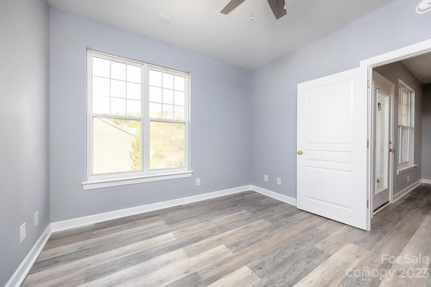18605 Ruffner Drive Cornelius, NC 28031 - Photo 26 of 34 an empty room with windows and closet