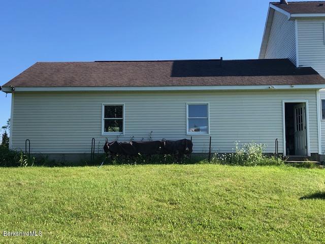 110 Hill Cemetery Road Windsor, MA 01270 - Photo 13 of 52 a front view of house with yard