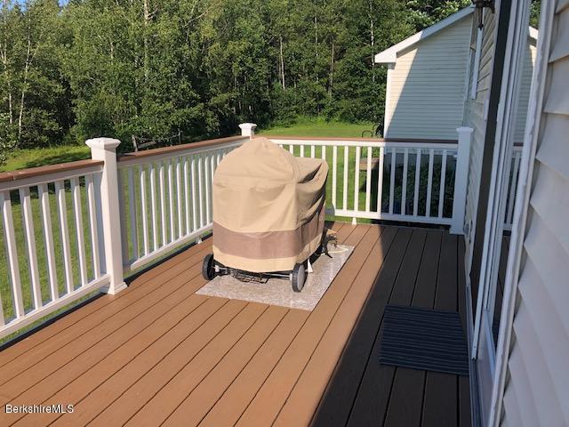 110 Hill Cemetery Road Windsor, MA 01270 - Photo 16 of 52 a view of balcony with wooden floor and outdoor seating