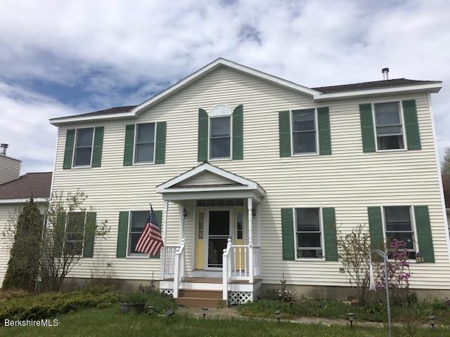 110 Hill Cemetery Road Windsor, MA 01270 - Photo 3 of 52 a front view of a house with a yard