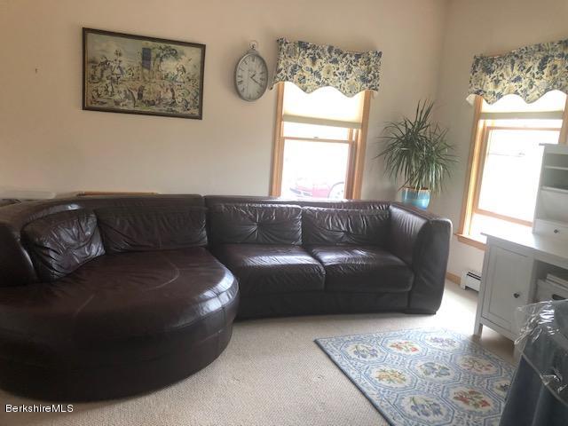 110 Hill Cemetery Road Windsor, MA 01270 - Photo 28 of 52 a living room with furniture and a large window