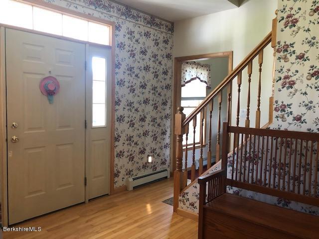 110 Hill Cemetery Road Windsor, MA 01270 - Photo 29 of 52 a view of an entryway with wooden floor and stairs