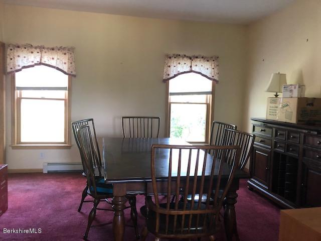 110 Hill Cemetery Road Windsor, MA 01270 - Photo 31 of 52 a view of a dining room with furniture window and wooden floor
