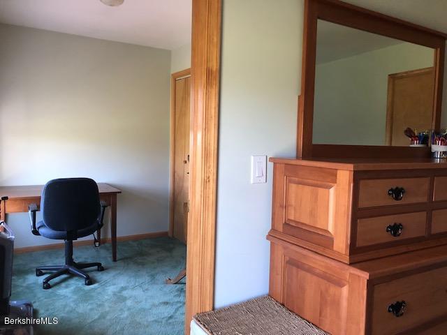 110 Hill Cemetery Road Windsor, MA 01270 - Photo 38 of 52 a view of a hallway with workspace and a mirror
