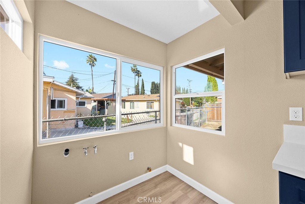 9734 Rio Hondo Parkway El Monte, CA 91733 - Photo 19 of 45 a view of empty room with wooden floor and fan