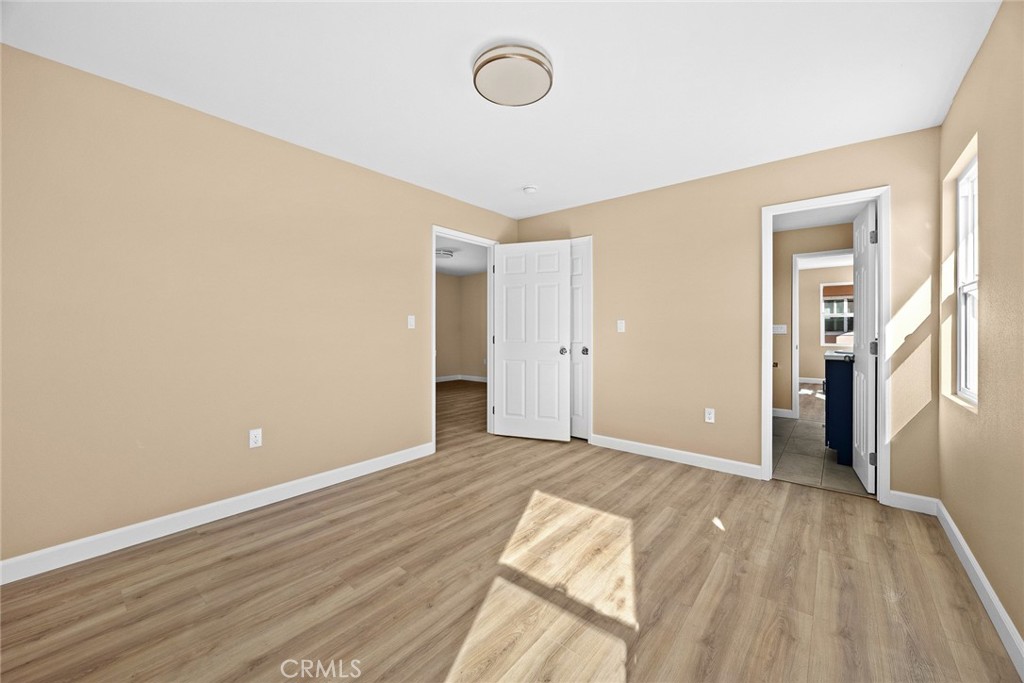 9734 Rio Hondo Parkway El Monte, CA 91733 - Photo 22 of 45 a view of room with wooden floor