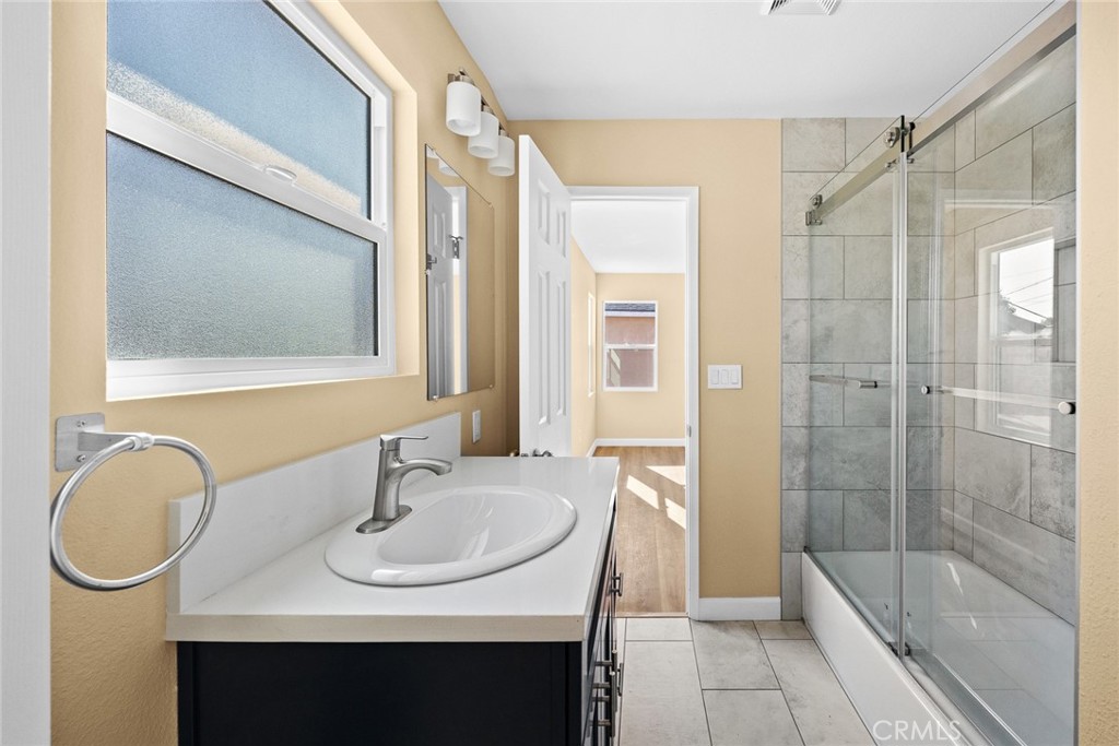 9734 Rio Hondo Parkway El Monte, CA 91733 - Photo 24 of 45 a bathroom with a sink and a mirror