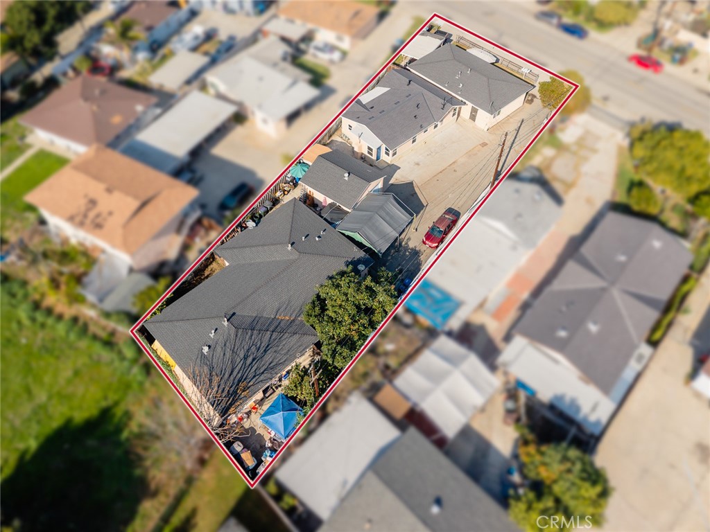 9734 Rio Hondo Parkway El Monte, CA 91733 - Photo 34 of 45 an aerial view of a house with a yard and outdoor seating