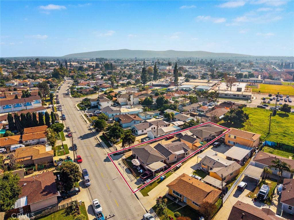 9734 Rio Hondo Parkway El Monte, CA 91733 - Photo 36 of 45 an aerial view of a city with lots of residential buildings and ocean view in back