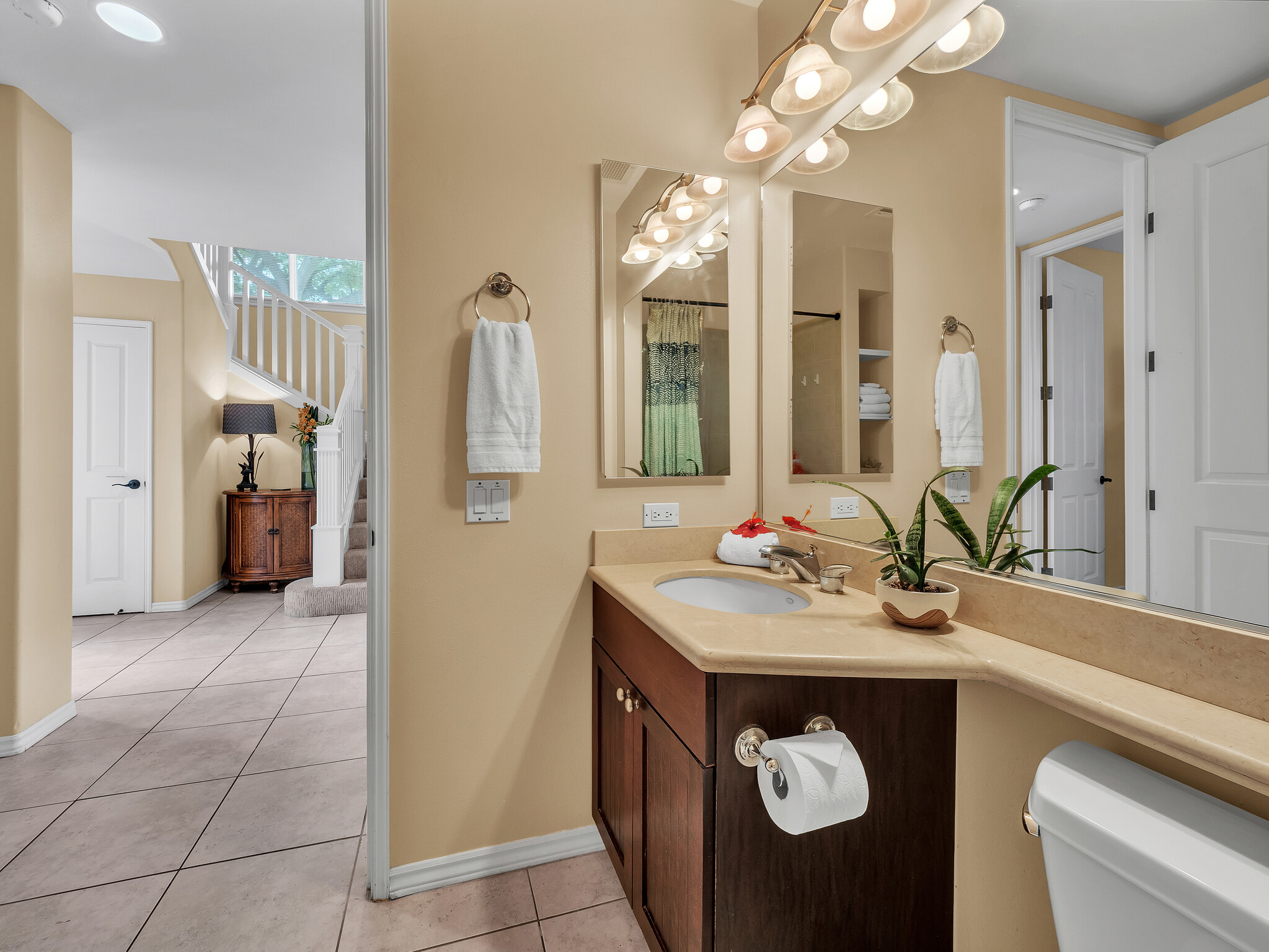 69-200 Pohakulana Place, Unit L4 Waikoloa, HI 96738 - Photo 13 of 29 a bathroom with a sink a vanity and a mirror