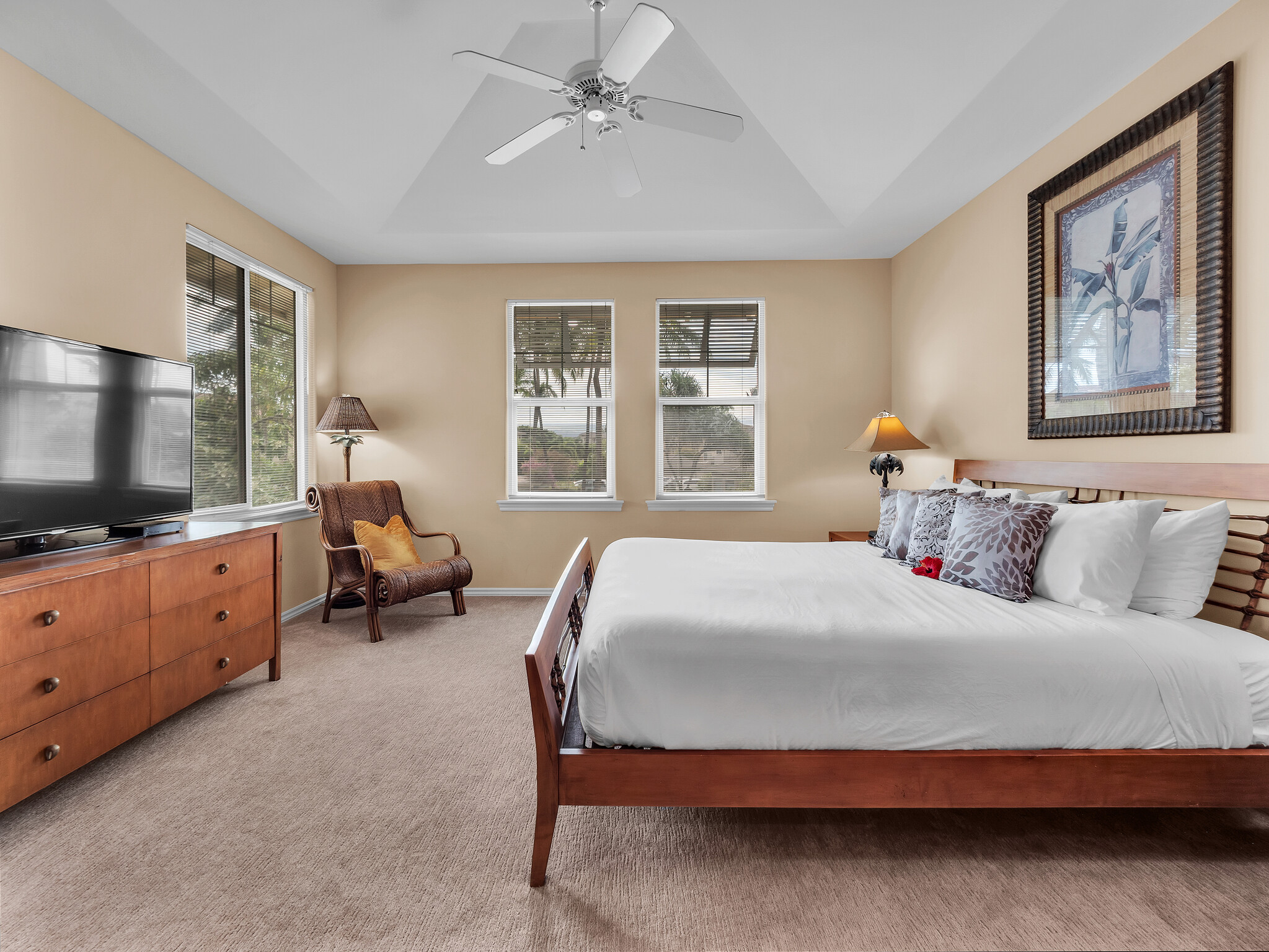 69-200 Pohakulana Place, Unit L4 Waikoloa, HI 96738 - Photo 16 of 29 a bedroom with a bed couch and window