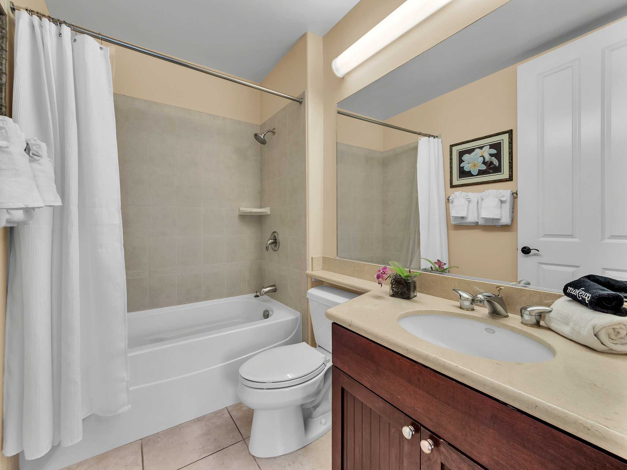 69-200 Pohakulana Place, Unit L4 Waikoloa, HI 96738 - Photo 20 of 29 a bathroom with a granite countertop sink toilet and shower