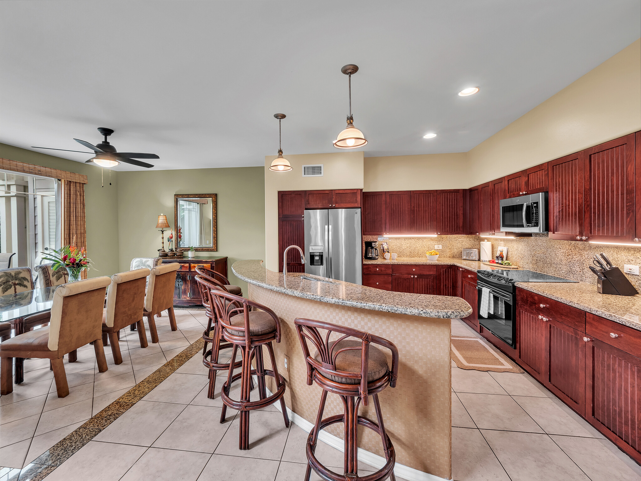 69-200 Pohakulana Place, Unit L4 Waikoloa, HI 96738 - Photo 5 of 29 a large kitchen with lots of counter space a sink and appliances