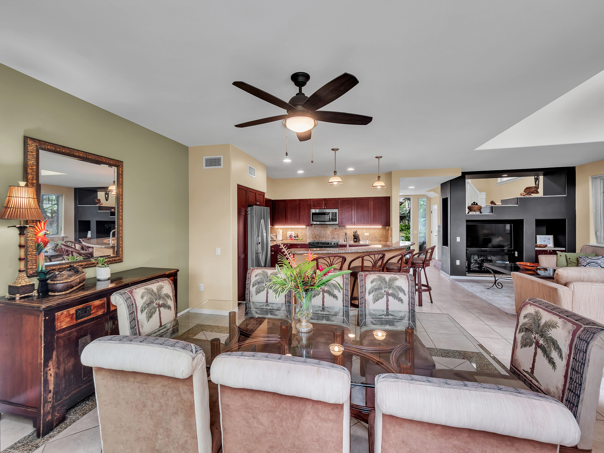 69-200 Pohakulana Place, Unit L4 Waikoloa, HI 96738 - Photo 9 of 29 a living room with furniture and a fireplace