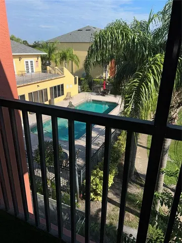 a view of balcony with furniture and deck