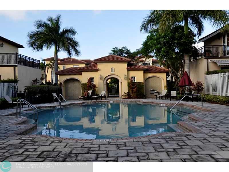105 Via Floresta Drive Boca Raton, FL 33487 - Photo 23 of 26 a view of a house with a patio