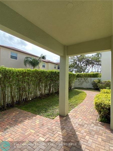 105 Via Floresta Drive Boca Raton, FL 33487 - Photo 25 of 26 a view of a garden