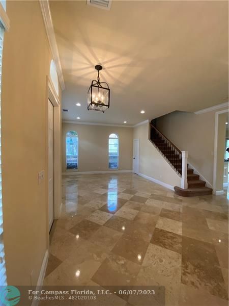 105 Via Floresta Drive Boca Raton, FL 33487 - Photo 6 of 26 a view of entryway and hall