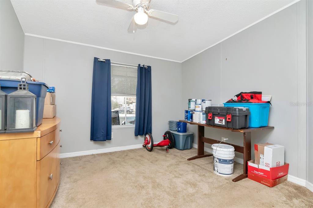 10404 Hawk Court Riverview, FL 33578 - Photo 24 of 38 a living room with furniture and a wooden floor